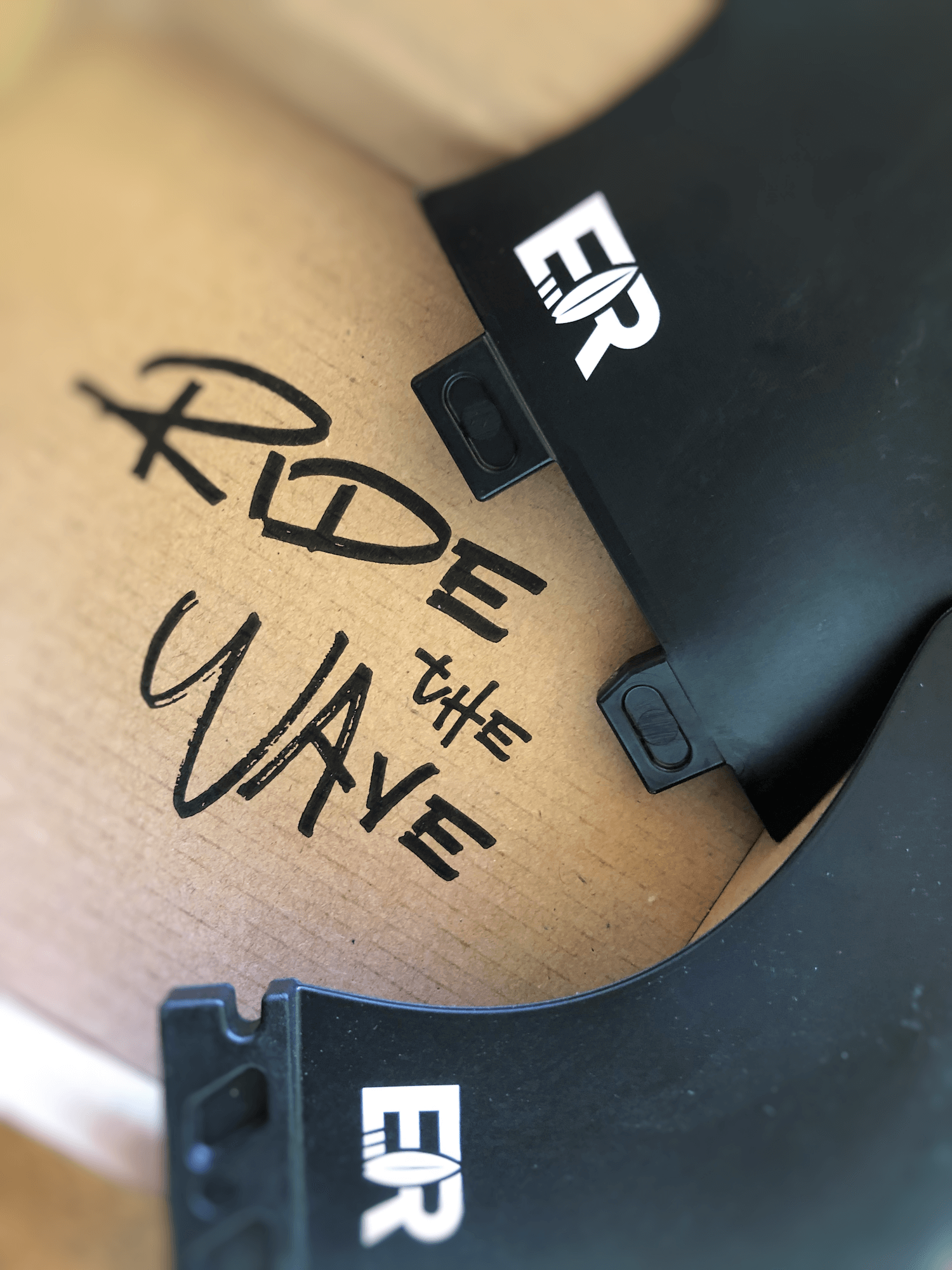 FCS and Futures fin box systems side by side — surfboard fin systems explained