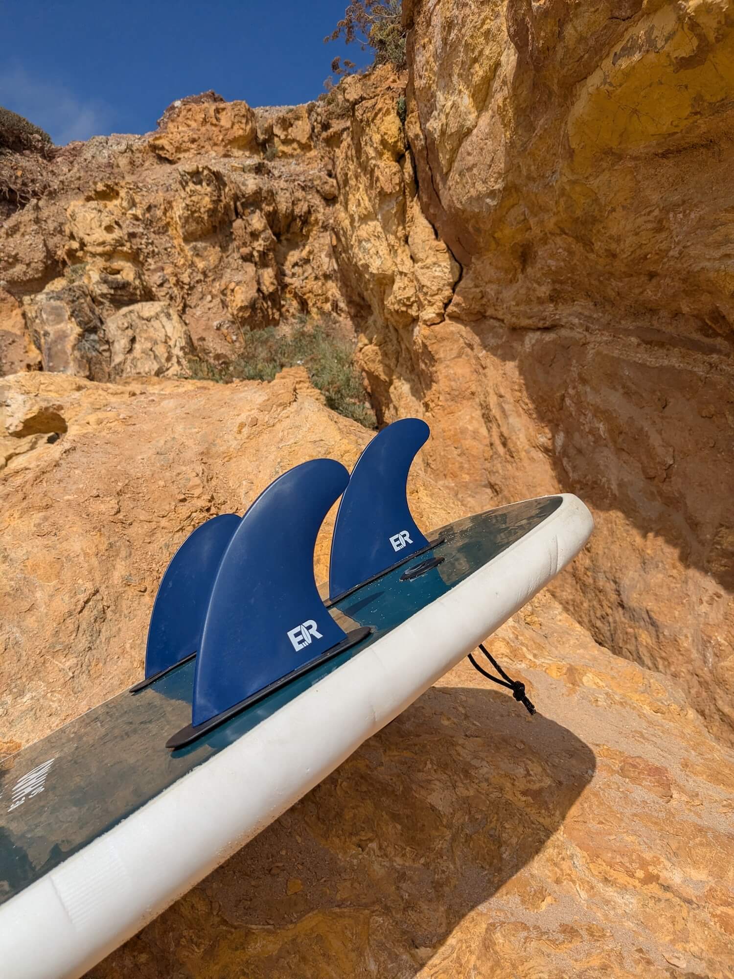 Surf fins close-up — flexible vs stiff fin comparison